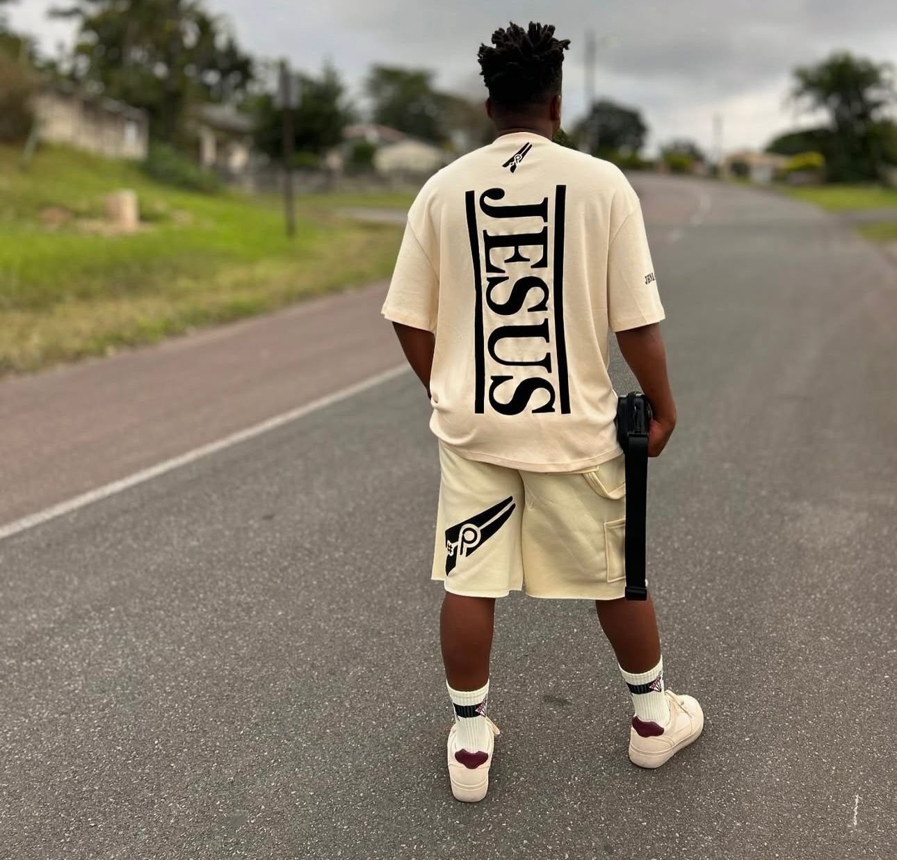 JESUS tee in cream — walking down the open road